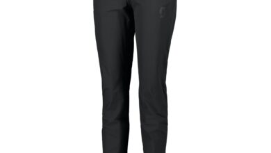 Black women's outdoor pants for hiking and trekking, lightweight and durable.