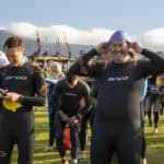 Participants preparing for a triathlon at Keswick Mountain Festival in outdoor gear.