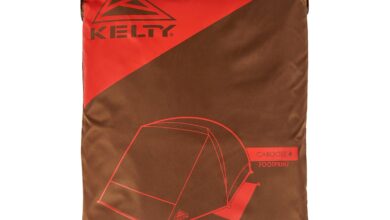 Lightweight outdoor camping tent in red and brown, with Kelty branding for outdoor adventure use.