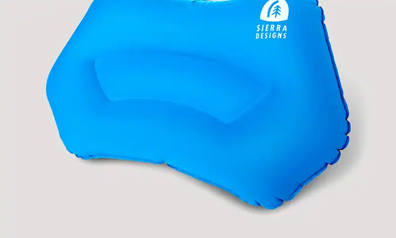 Inflatable blue pool float with Sierra Designs logo for outdoor swimming and relaxation.