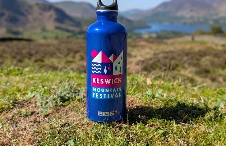 Outdoor Insight mountain festival themed water bottle for outdoor adventures.