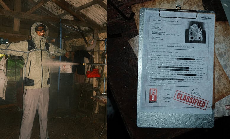 Person in protective gear pointing at a screen in a rustic setting.