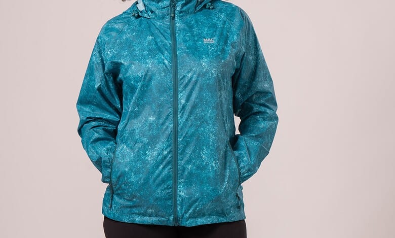 Women wearing a blue waterproof jacket for outdoor activities.