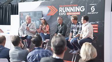 Panel discussion at The International Running Expo Amsterdam with speakers and audience.