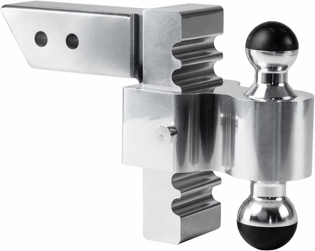 Heavy-duty trailer hitch ball mount with adjustable height for towing.