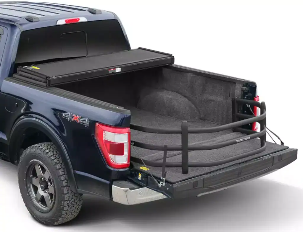 Protective truck bed cover with safety rails, ideal for secure cargo transport and outdoor use.