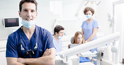 Smiling dentist and dental team in a dental office, home dental care tips in Leesburg VA