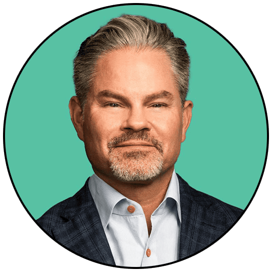 A professional man in a suit with a confident expression, portrait style.