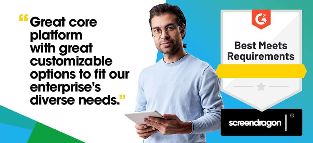 A man holding a tablet, displaying a screenshot with text about customizable requirements options for enterprise needs.