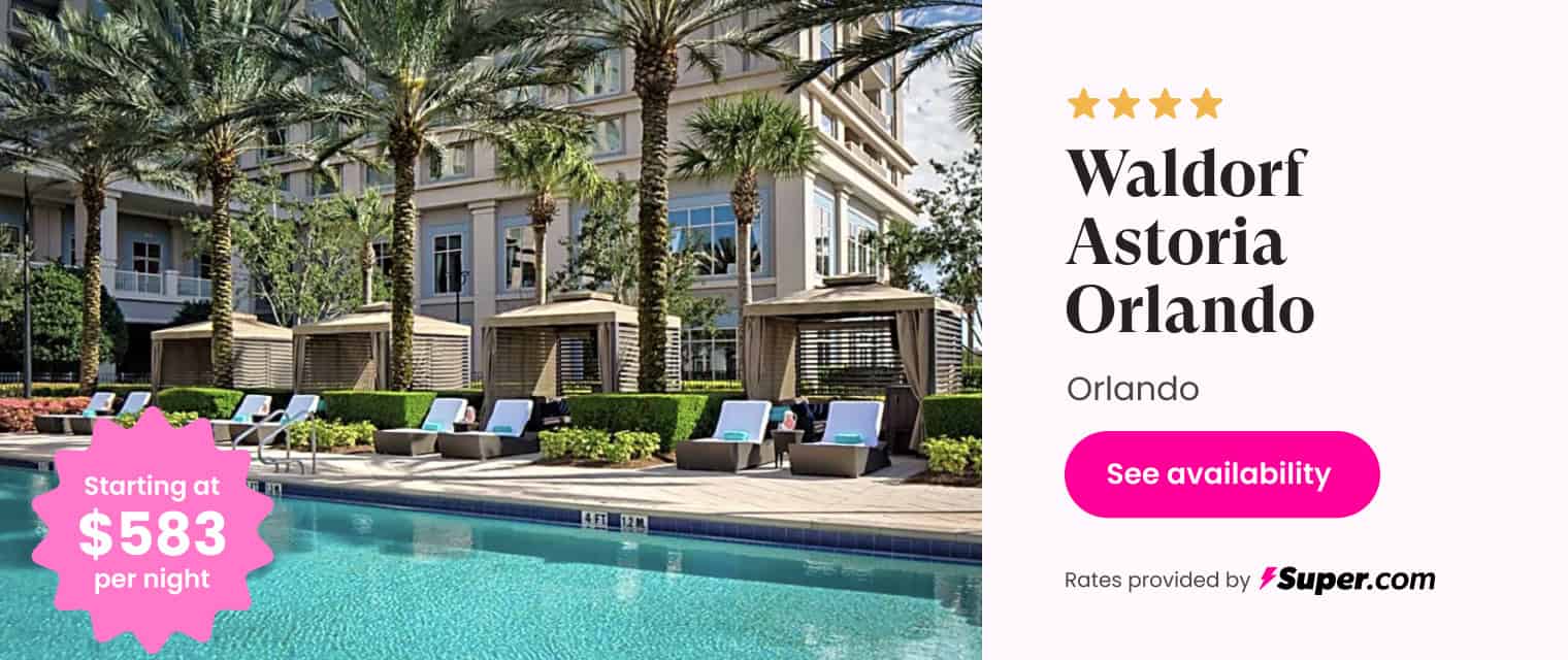 Luxury Orlando hotel with pool and sun loungers at Waldorf Astoria Orlando.