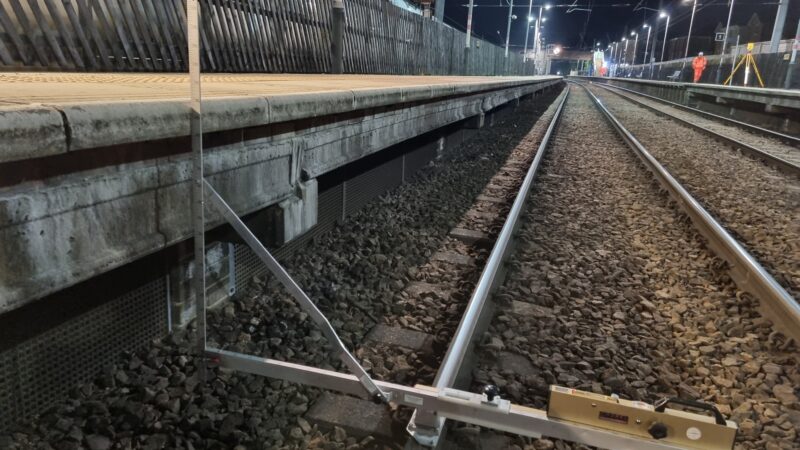railway survey at train station at night