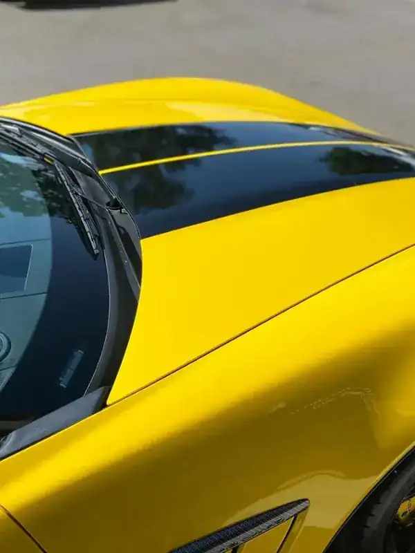 Professional window tinting on sports car