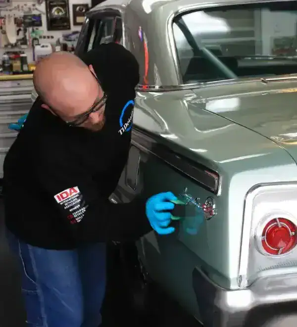 working on luxury car