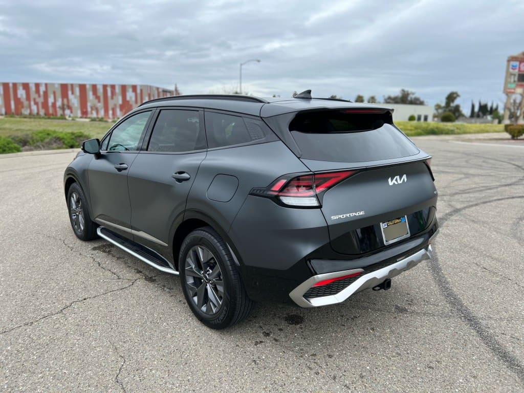 Kia Sportage SUV parked outdoors after professional detailing.