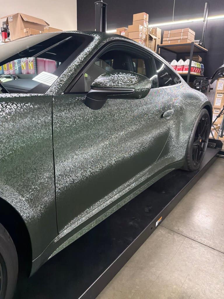 High-end car with water spots after detailing at T1Detailing.