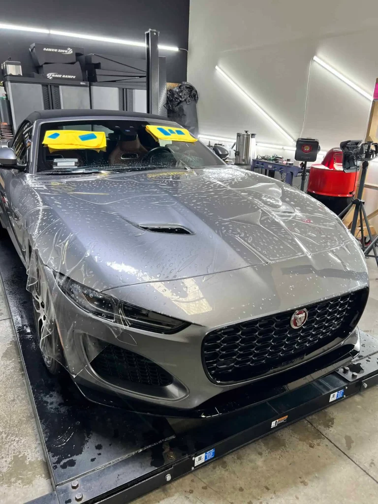 Luxury Jaguar F-Type being detailed at T1Detailing shop.