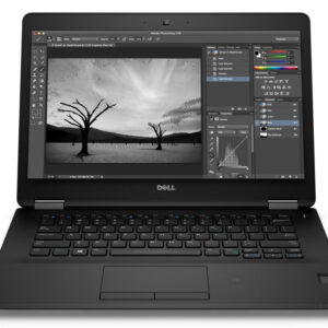 Image of a Dell laptop displaying photo editing software with black and white landscape.