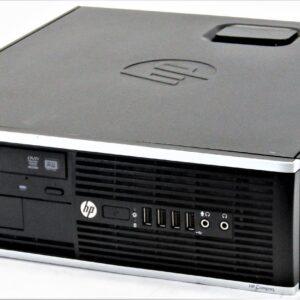 Υπολογιστής HP desktop με θήκη απόστασης από το μπροστινό μέρος και συσκευές εισόδου/εξόδου.