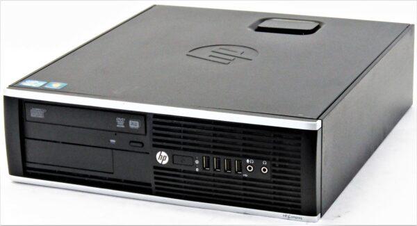 Υπολογιστής HP desktop με θήκη απόστασης από το μπροστινό μέρος και συσκευές εισόδου/εξόδου.