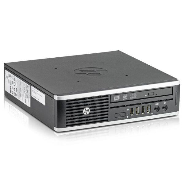 Ασπρόμαυρος επιτραπέζιος υπολογιστής HP με DVD drive και USB θύρες.