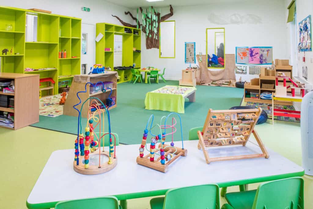 Bright, colourful early childhood learning environment with educational toys, creative art spaces, and child-friendly furniture at Thrive Childcare in a welcoming, safe setting for young children.