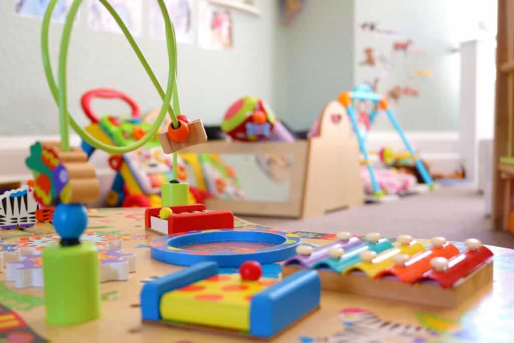 Bright colourful children's toys and play area at Thrive Childcare, promoting early childhood development and safe, engaging environment for kids.