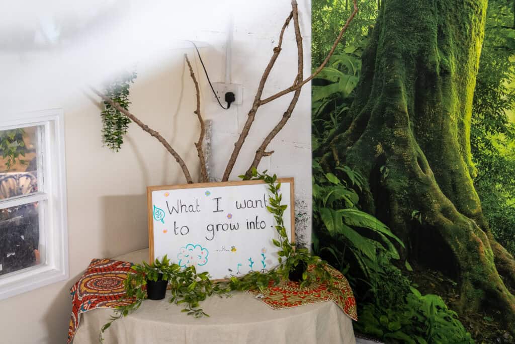 Bright indoor space with educational decor and natural elements.