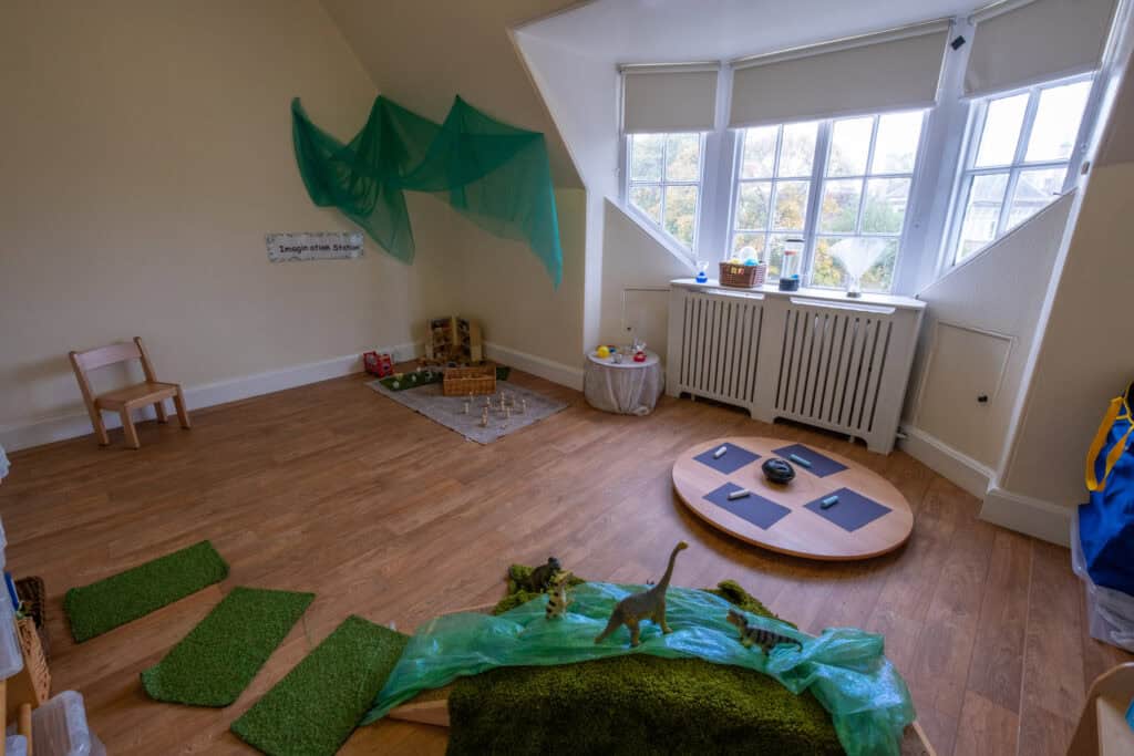 Bright, welcoming childcare playroom with toys, animal figures, and imaginative space for early learning at Thrive Childcare centre. Perfect environment for preschool children to explore and develop.