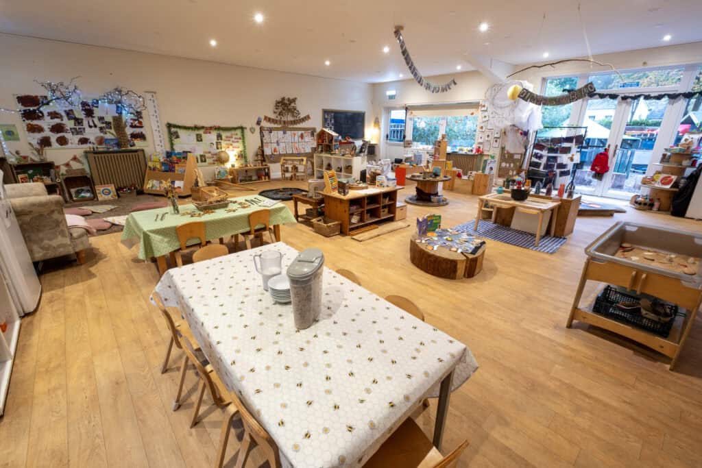 Bright and welcoming childcare playroom at Thrive Childcare, featuring age-appropriate toys, arts and crafts, and educational activities to promote early childhood development.