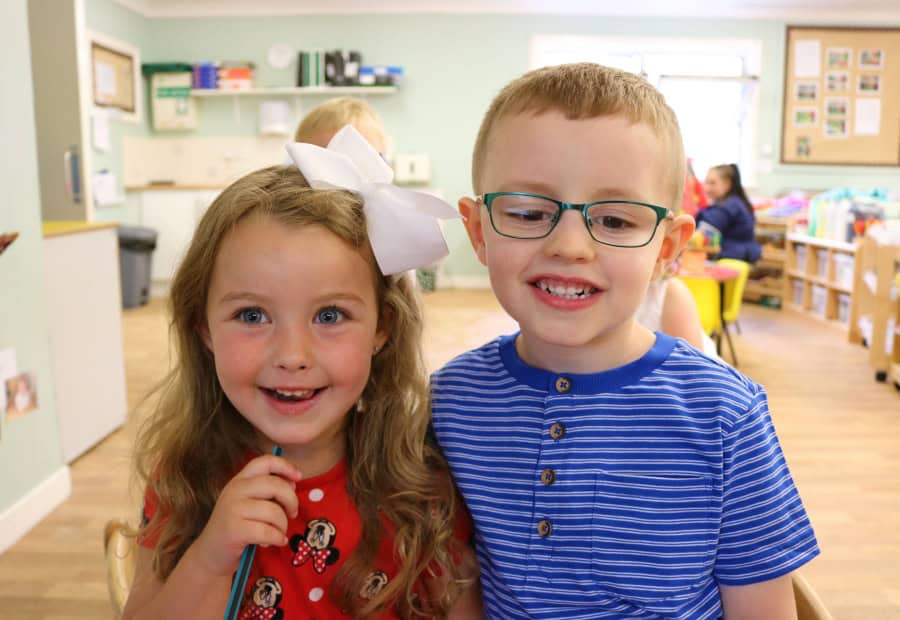 Bright young children enjoying creative activities at Thrive Childcare, a trusted early years education provider focussing on child development, learning, and play in a safe environment.