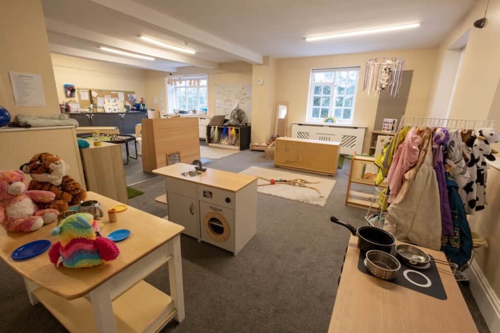 Bright early learning classroom at Thrive Childcare with toys, books, and play areas designed for children's development and care in a safe, nurturing environment.