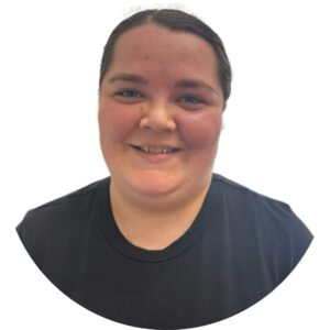 Warm smiling woman at Thrive Childcare, providing caring and inclusive early childhood education in a supportive environment.