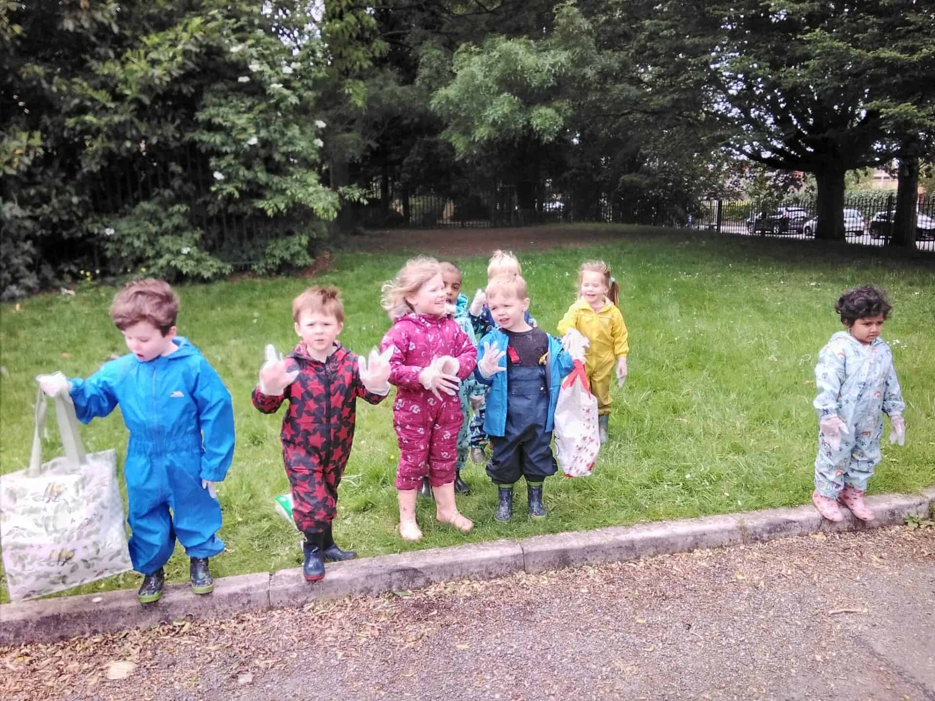 1. Brightly dressed children playing outdoors at Thrive Childcare, showcasing outdoor activities and child development in a safe environment.