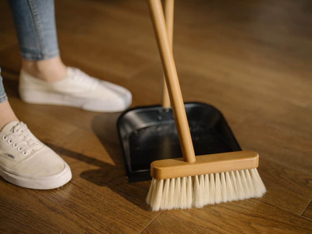 pexels-cottonbro-4108715 (1) - Upstairs Downstairs Cleaning Service sweeping and collecting dust