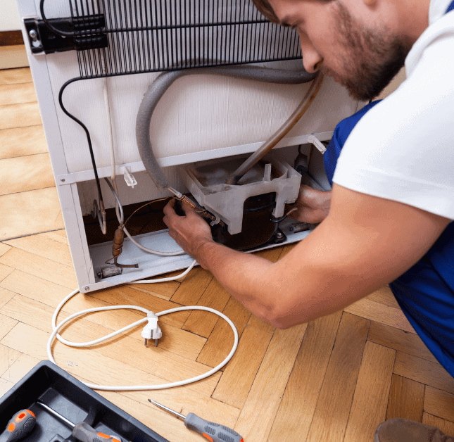 clean-fridge-condenser-coils - Upstairs Downstairs Cleaning Service deep clean fridge vents