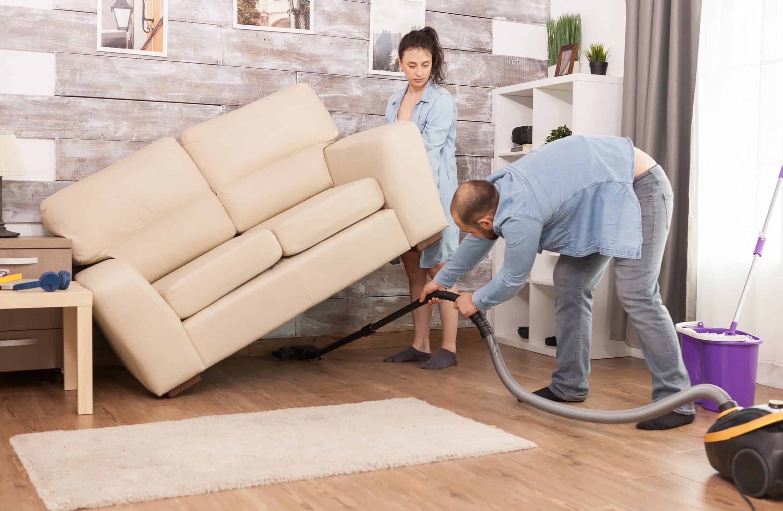 Wife picks up sofa