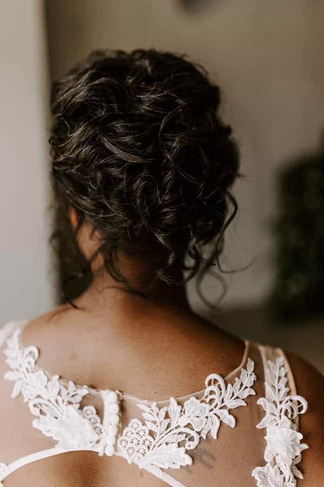 Natural curled updo bridal hairstyle