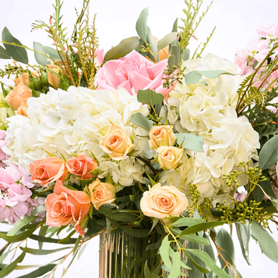 Luxury designer’s choice flower arrangement in blush and cream tones
