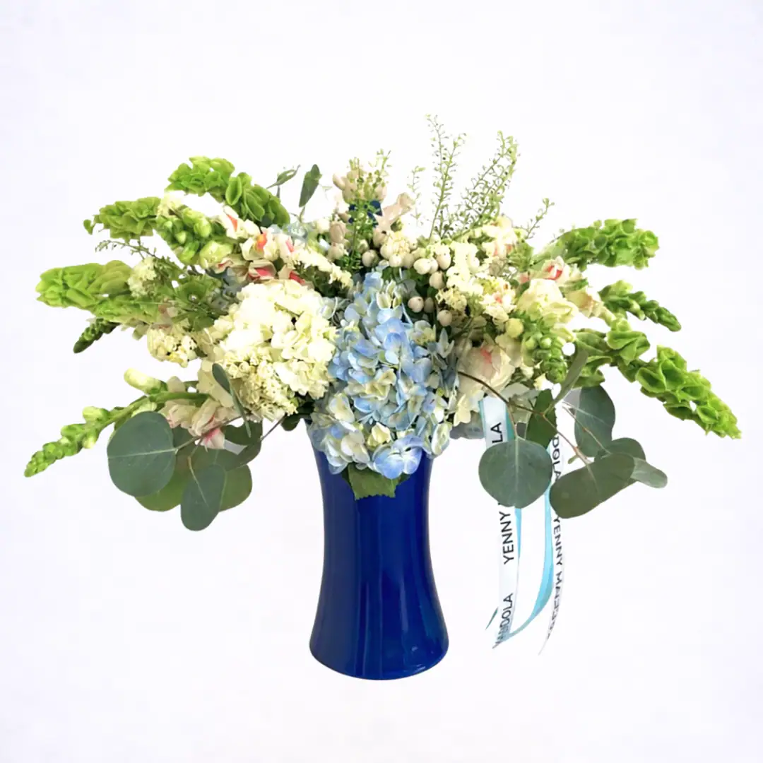 Luxury blue hydrangea flower arrangement in cobalt blue vase