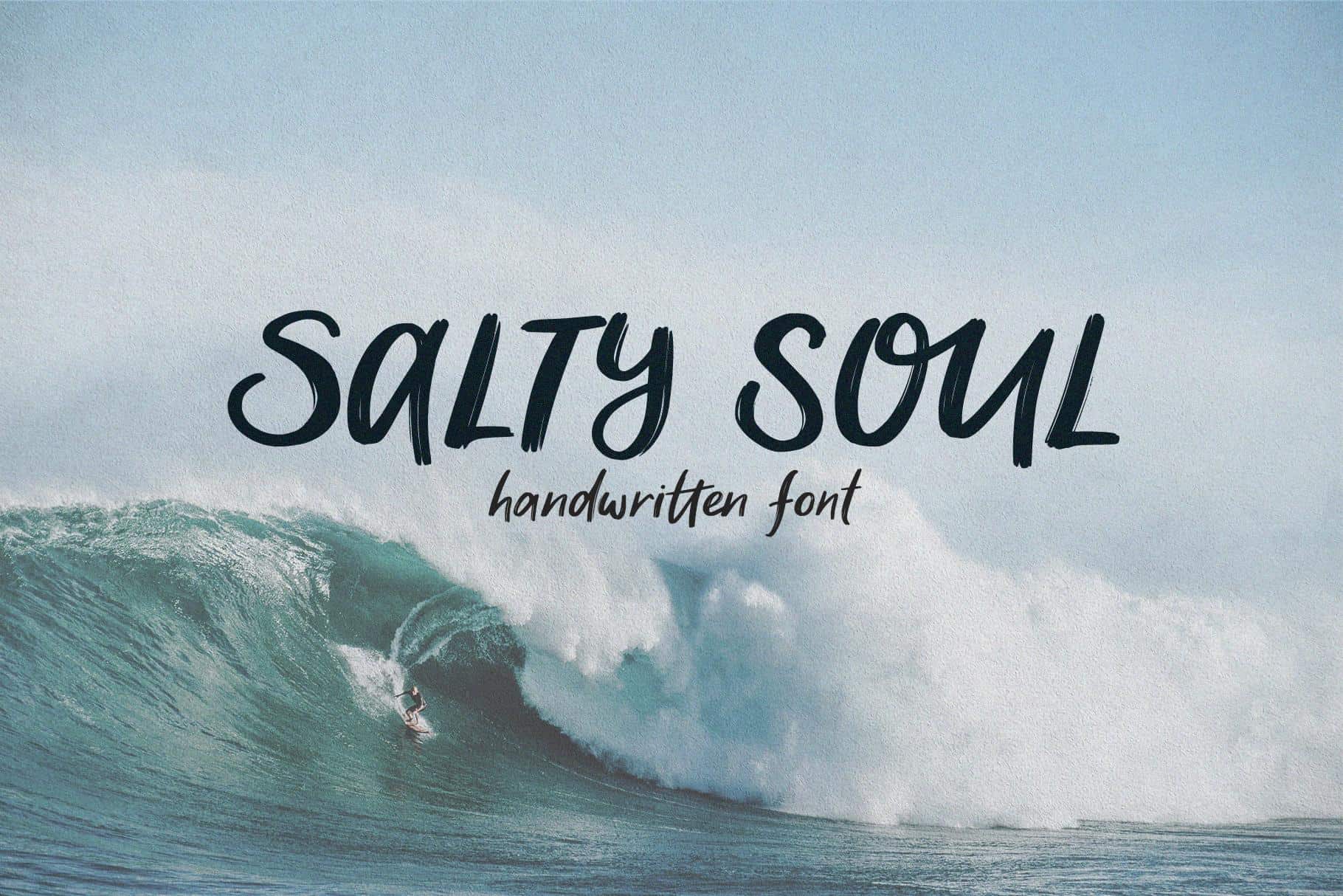 Salty Soul handwritten font with sea wave background for coastal design.