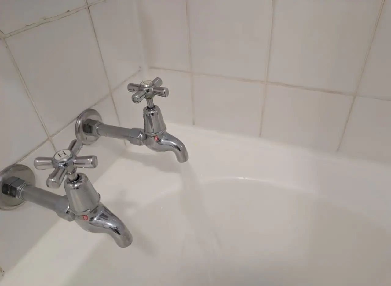Bathroom sink taps and plumbing fixtures.