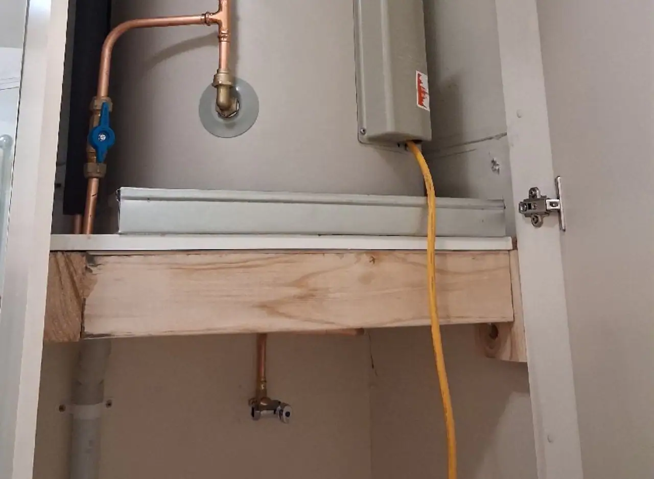 New hot water system setup with copper pipes and electrical connection in Carlton.