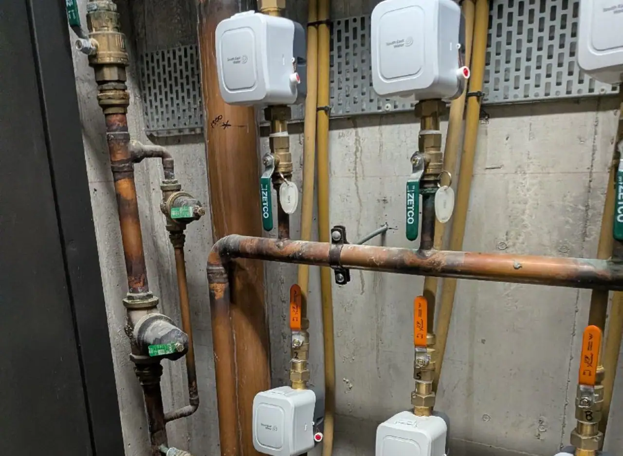 New electric hot water units installed on a plumbing wall in South Yarra.