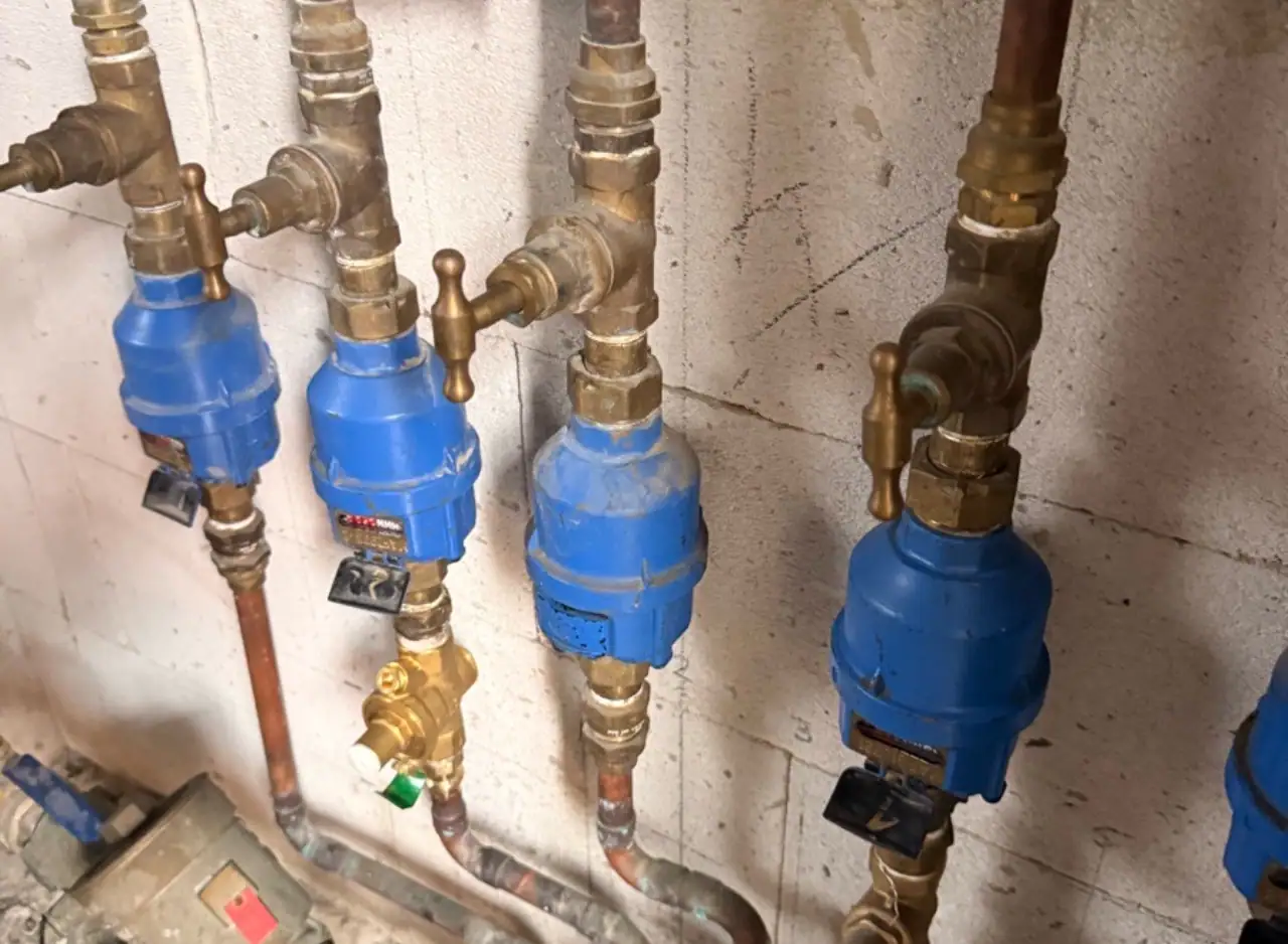 Water pressure management system with blue valves and pipes in Abbotsford.