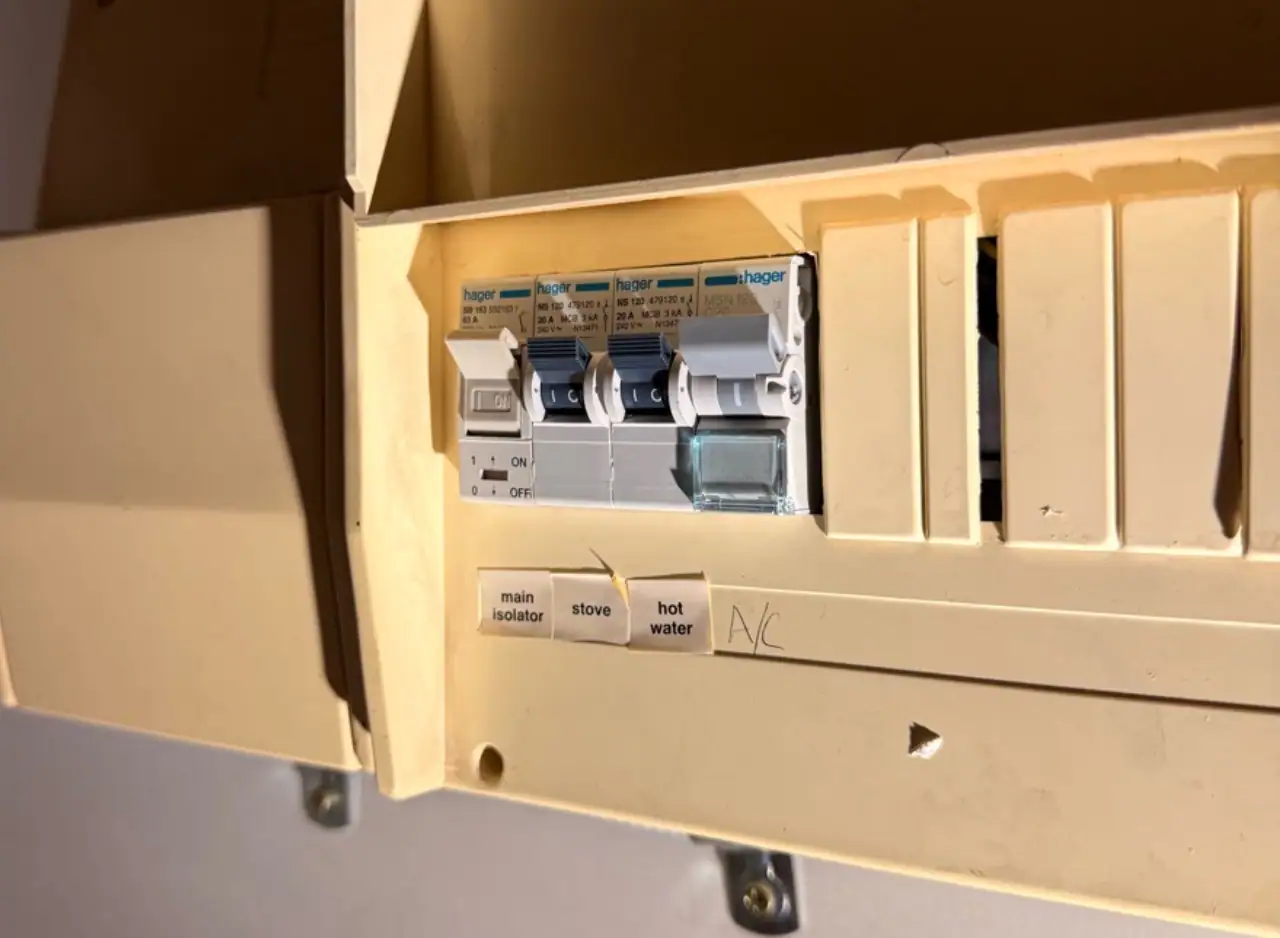 Electrical panel with circuit breakers for water pressure management in Abbotsford.