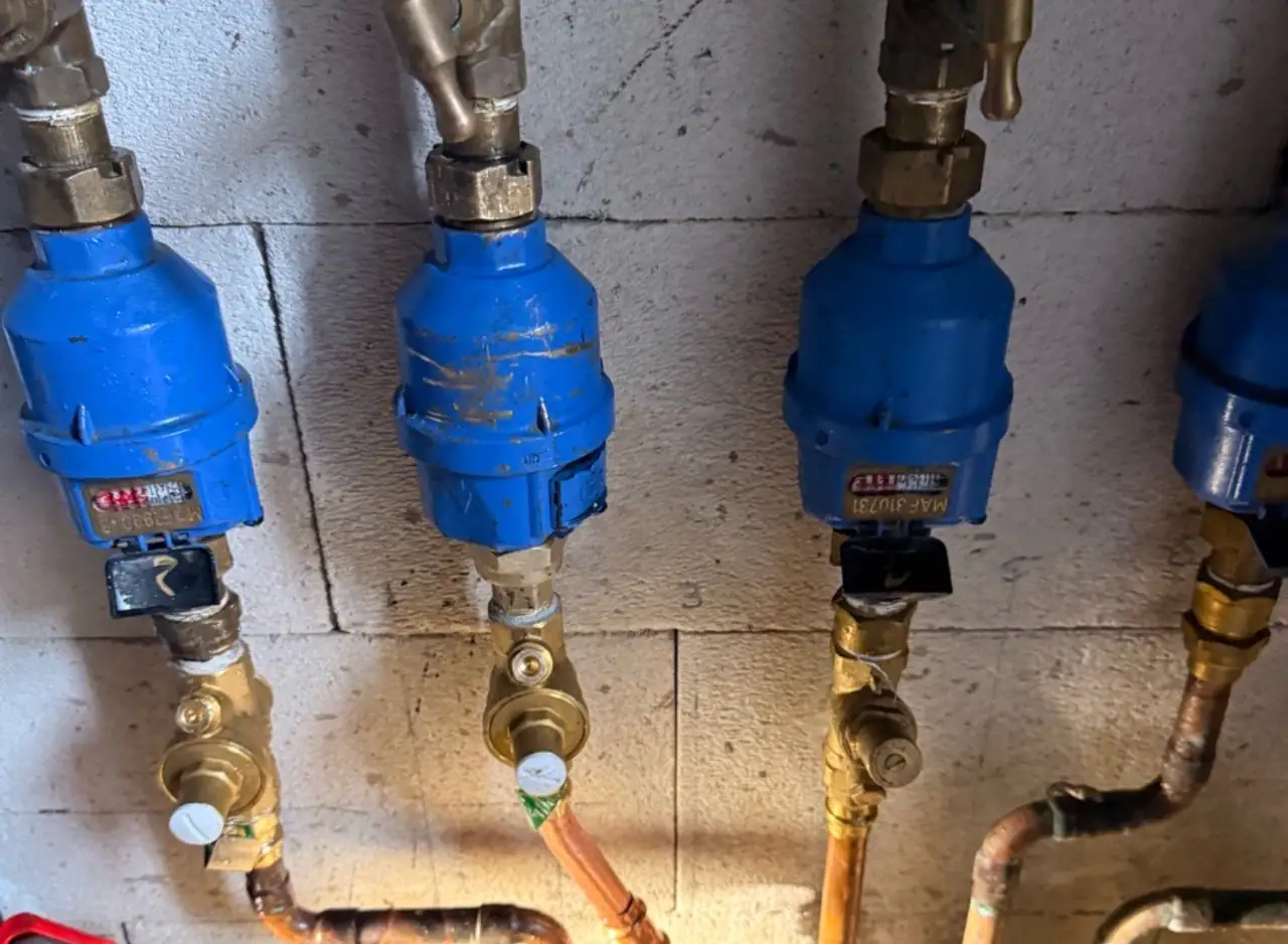Water pressure control valves installed on pipes in Abbotsford property.
