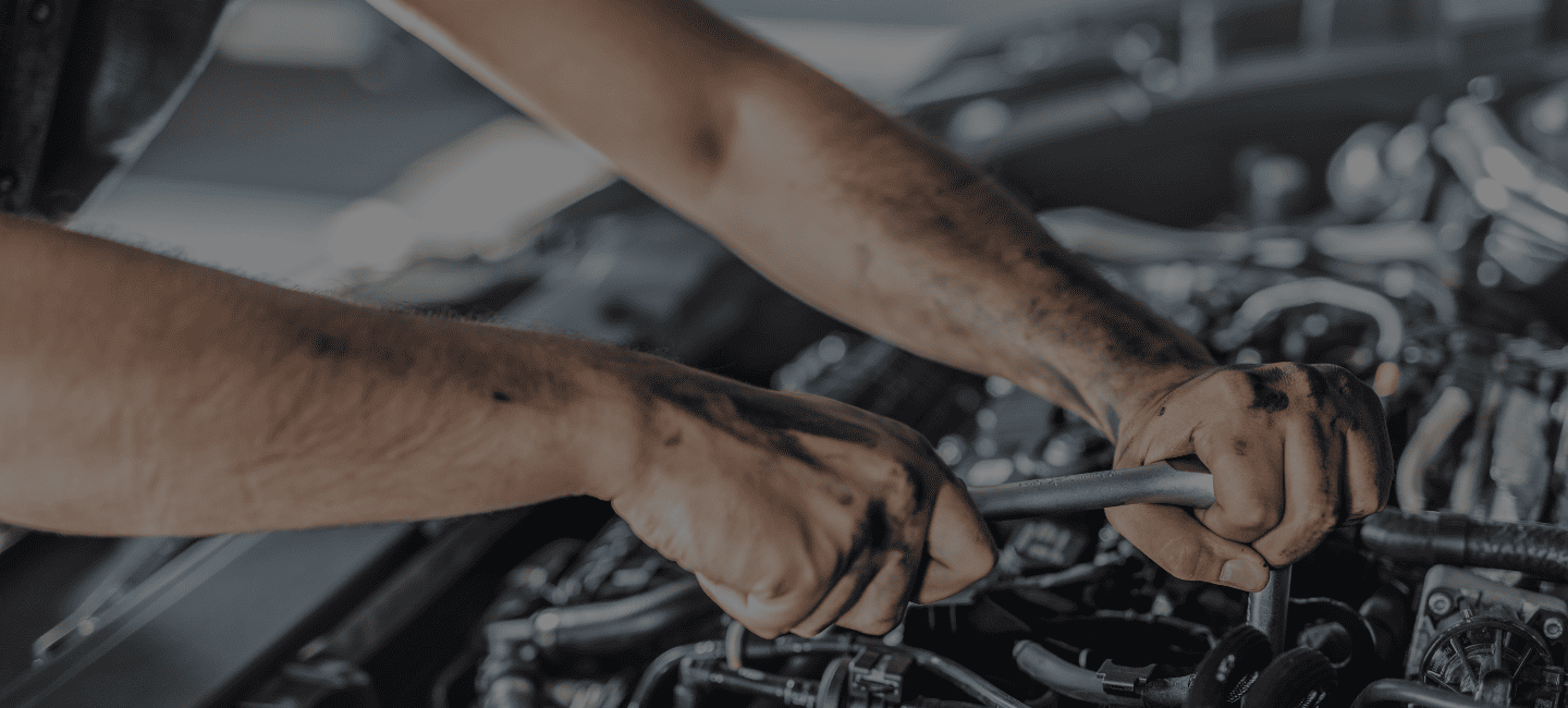 Technician inspecting a car at Advanced Auto Clinic in Niagara Falls
