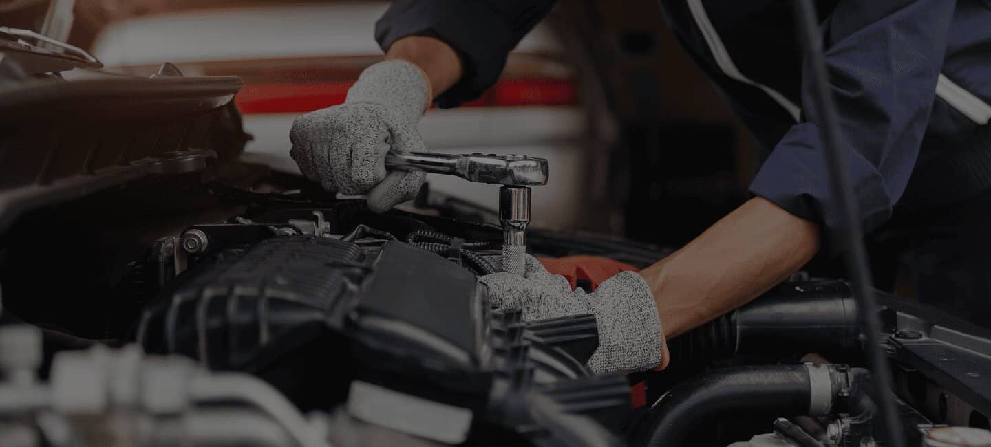 Certified mechanic servicing a vehicle at Advanced Auto Clinic in Niagara Falls