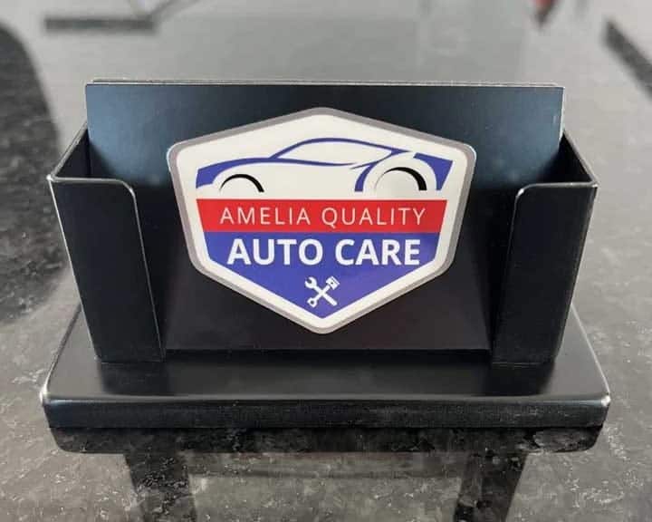 Auto care logo with car silhouette and tools for Allen's Quality Auto Care.