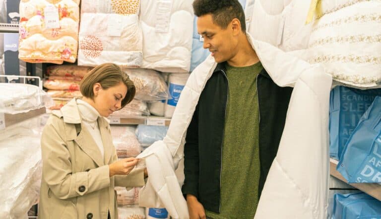 Couple at a Store Buying a Blanket